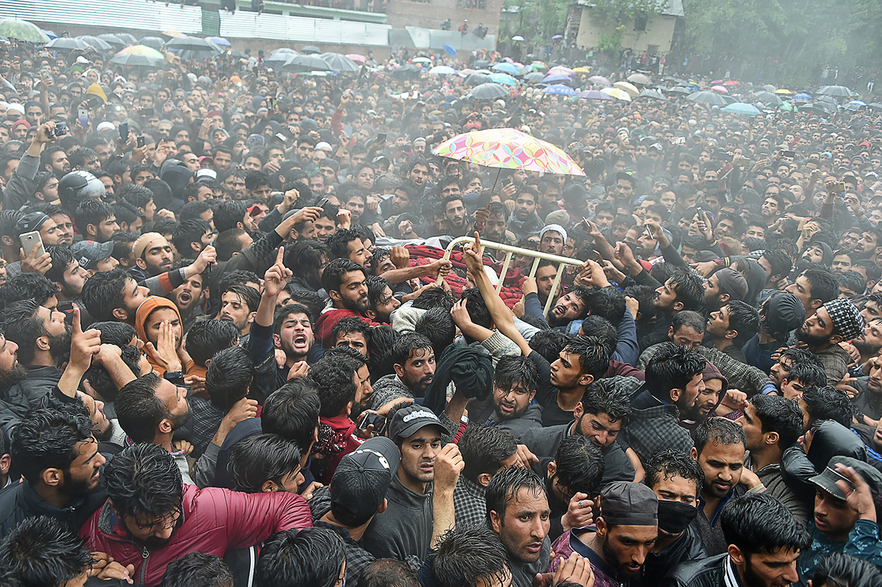 Kashmiri villagers carry a body of top militant commander Zakir Musa of Ansar Ghazwat-ul-Hind group, which claims affiliation with Al-Qaeda, during a funeral procession at Dadsar village in Tral, south of Srinagar