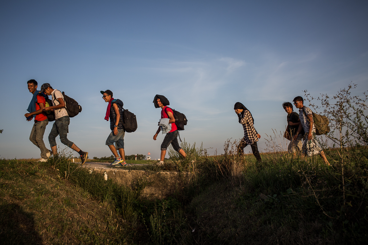 Asylum seekers walking across Croatia
