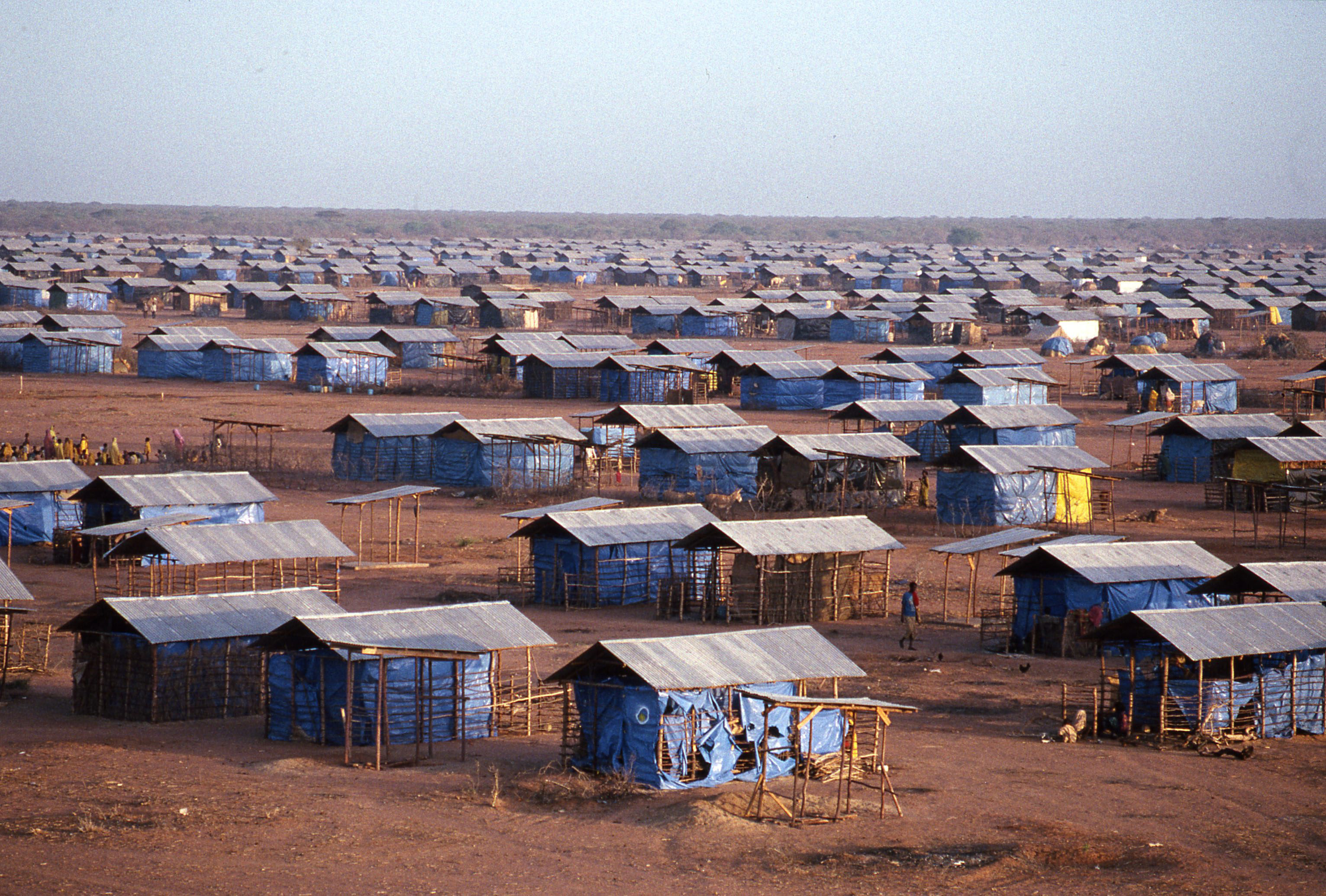 A landscape view of uniform refugee camp dwellings