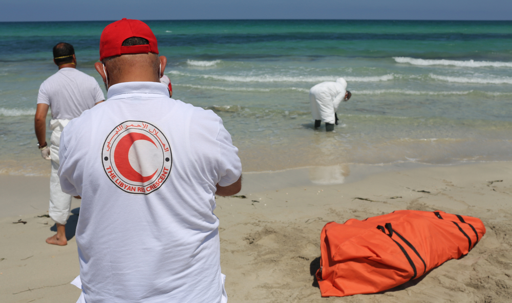 Libyan Red Crescent volunteers on beach recovering bodies