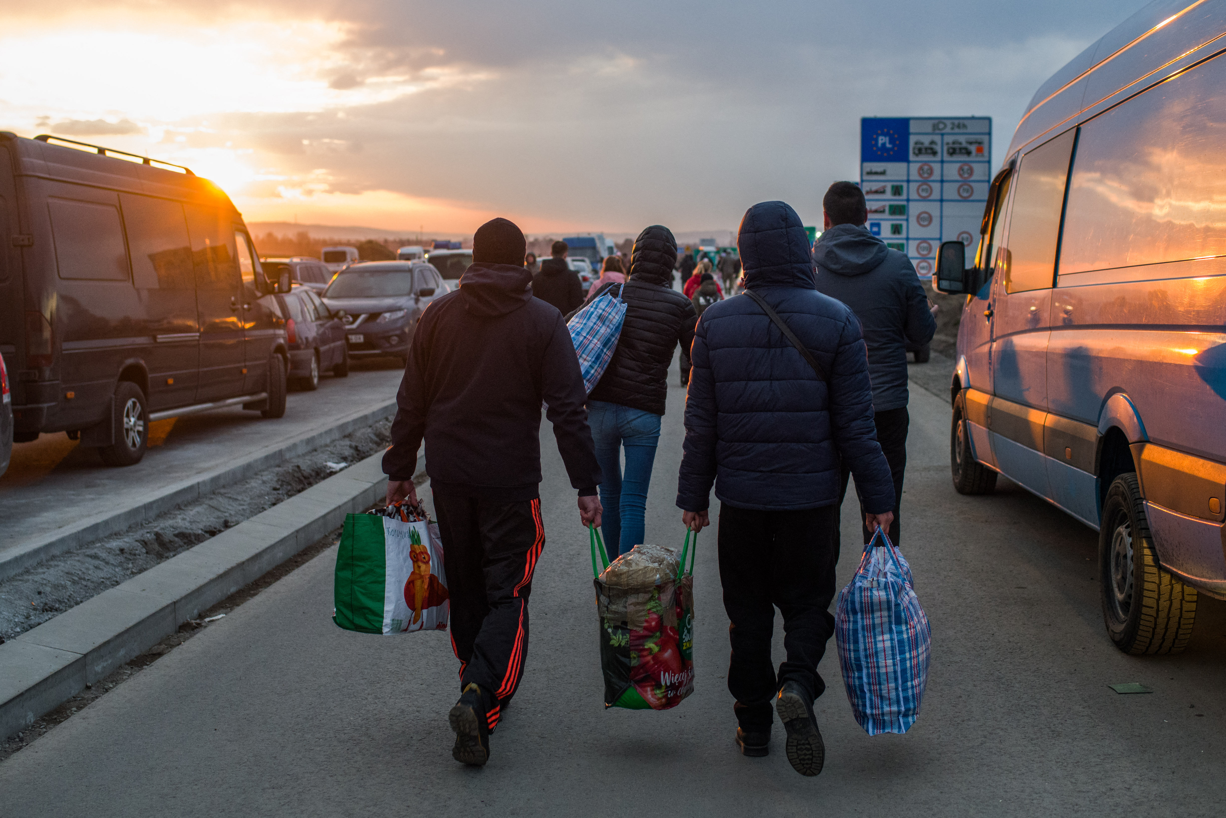 People escaping the Russian invasion of Ukraine reunite with others at the Medyka pedestrian border crossing in eastern Poland. As of 27 February, at least 368,000 people had fled to neighbouring countries, according to the UN.