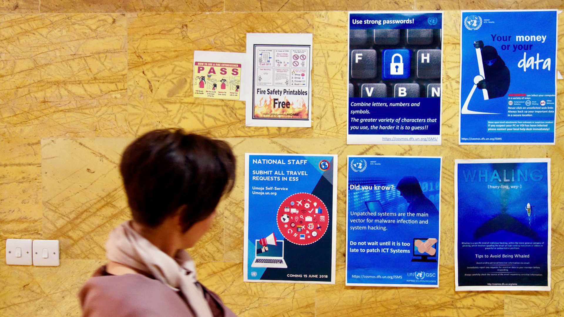 Posters about cyber security in the office of the UN Special Envoy for Yemen in Amman, Jordan.