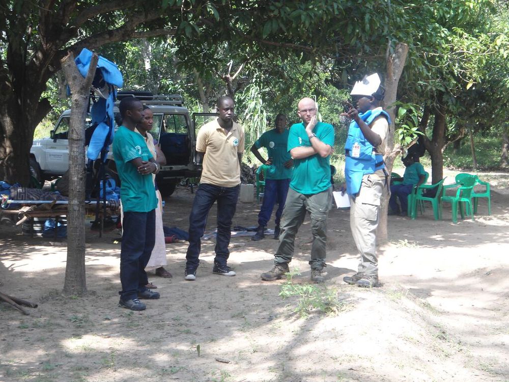 NPA personnel discussing a demining exercise in late 2013