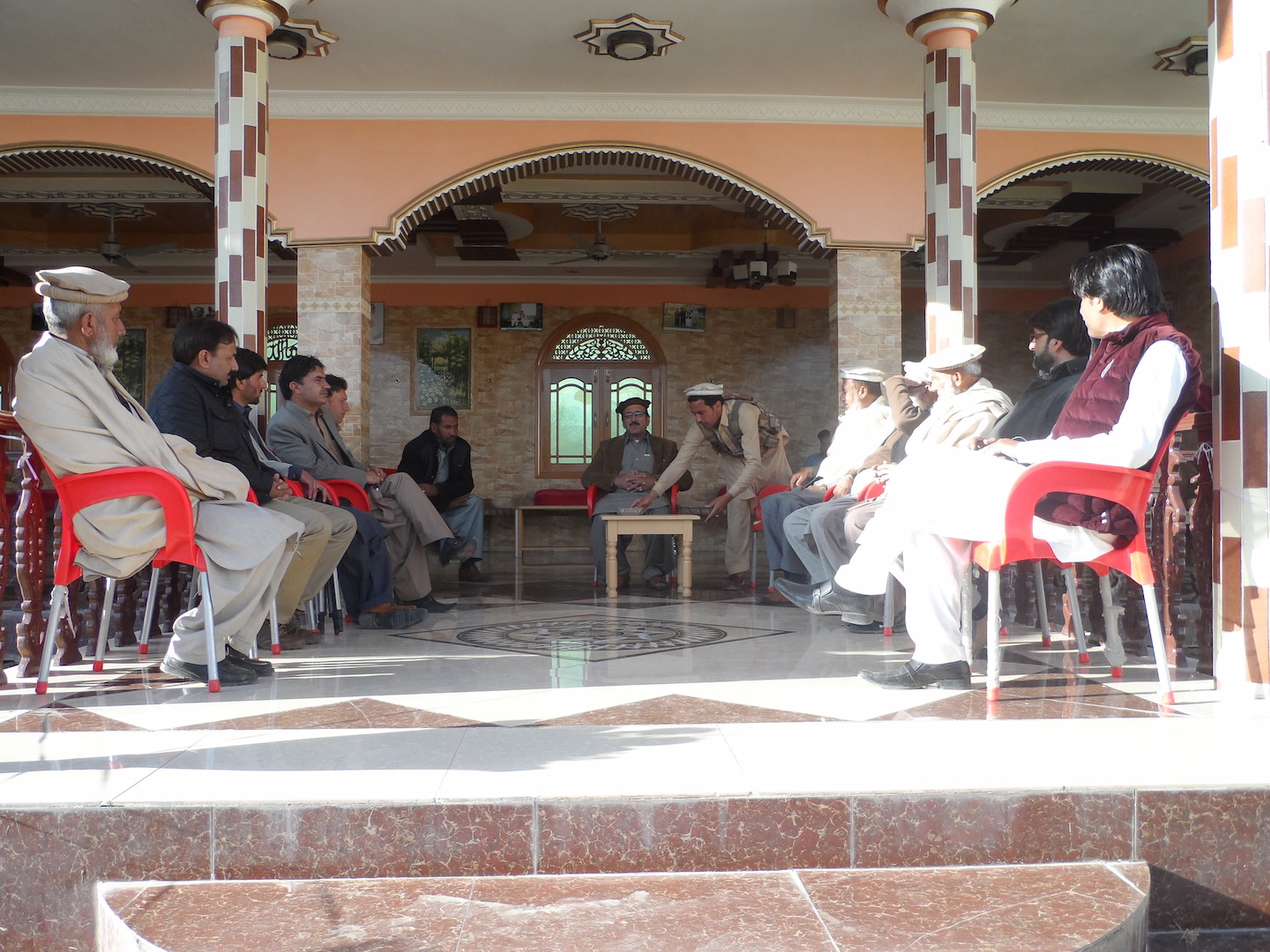Malik Anwar Zeb, a tribal elder in Pashat village in Bajaur Agency, holds a meeting to discuss the Pakistan government's proposed reforms for the FATA region