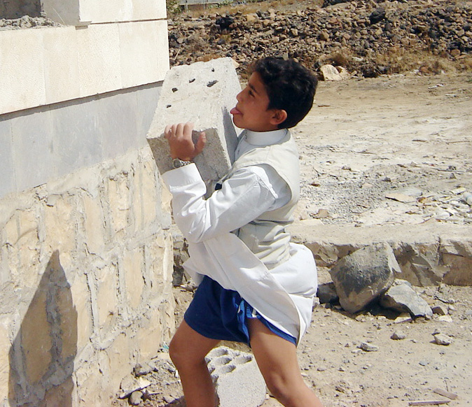 Zaid Abdullah al-Taweeli, 11, started working as a labourer a year ago
