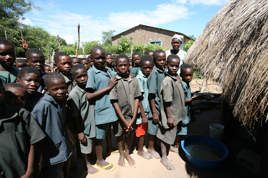 Students wait in line for lunch in Ngoma School, Sikaneka village, Maamba district, Zambia, 28 February 2007. Lower education in Zambia is divided into three levels; primary, junior secondary and upper secondary. Higher education is very limited and centr