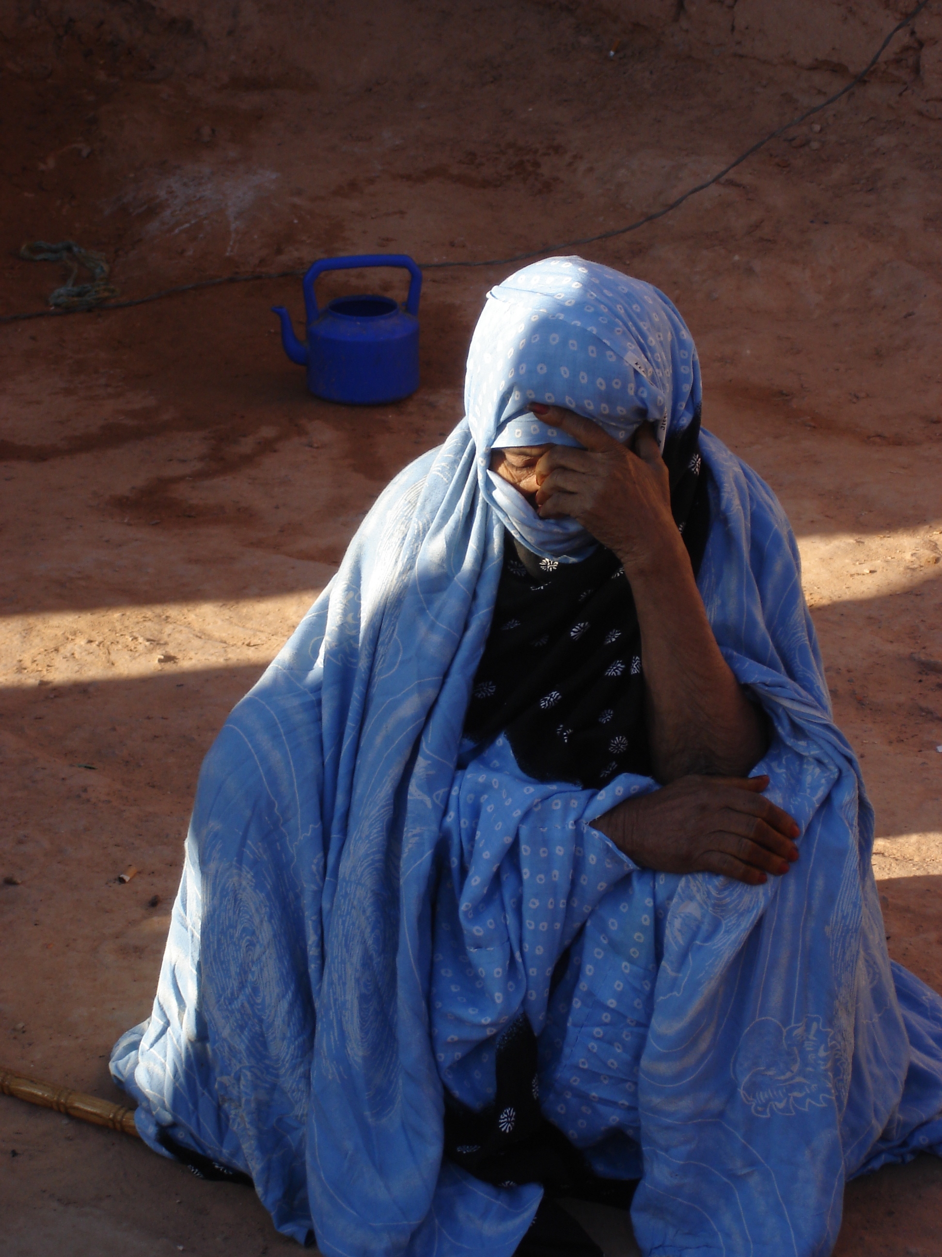 A Sahrawi refugee, divided from her family by the dispute, Western Sahara, April 2007. The Sahrawi people are divided by minefields, army outposts and a manmade wall of sand more than 2,400 km long. There has been a long-standing dispute that pits the Mor