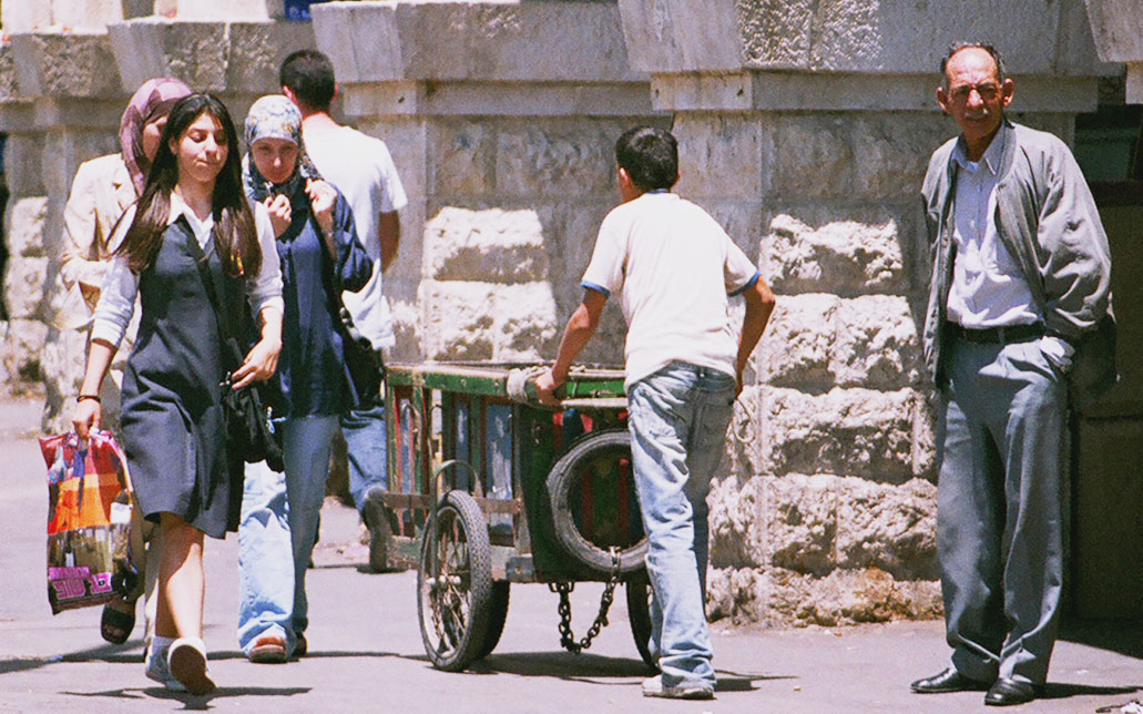 A child porter working the busy streets of East Jerusalem.