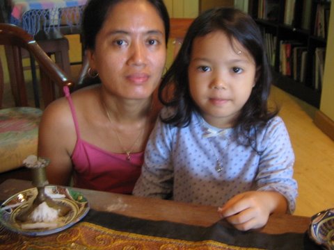 Corina Samuel, 43, and her five-year-old daughter Hannah. Their home outside the former capital Yangon was destroyed by Cyclone Nargis on 2 and 3 May 2008.