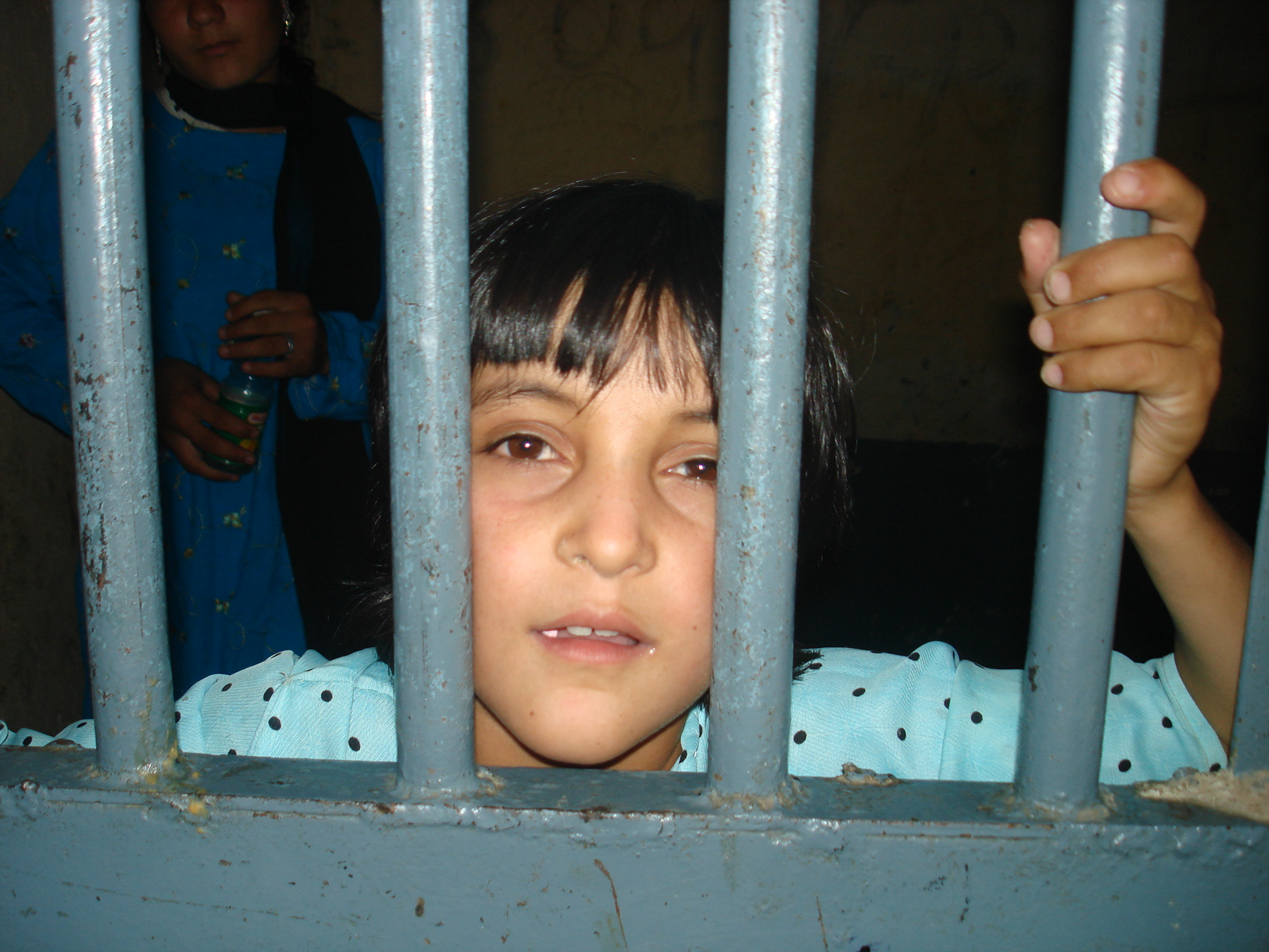 An Afghan girl living with her imprisoned mother in the Pul-e Charkhi prison in Kabul in 2007. More than 48 percent of children in detention said they were tortured, according to AIHRC.