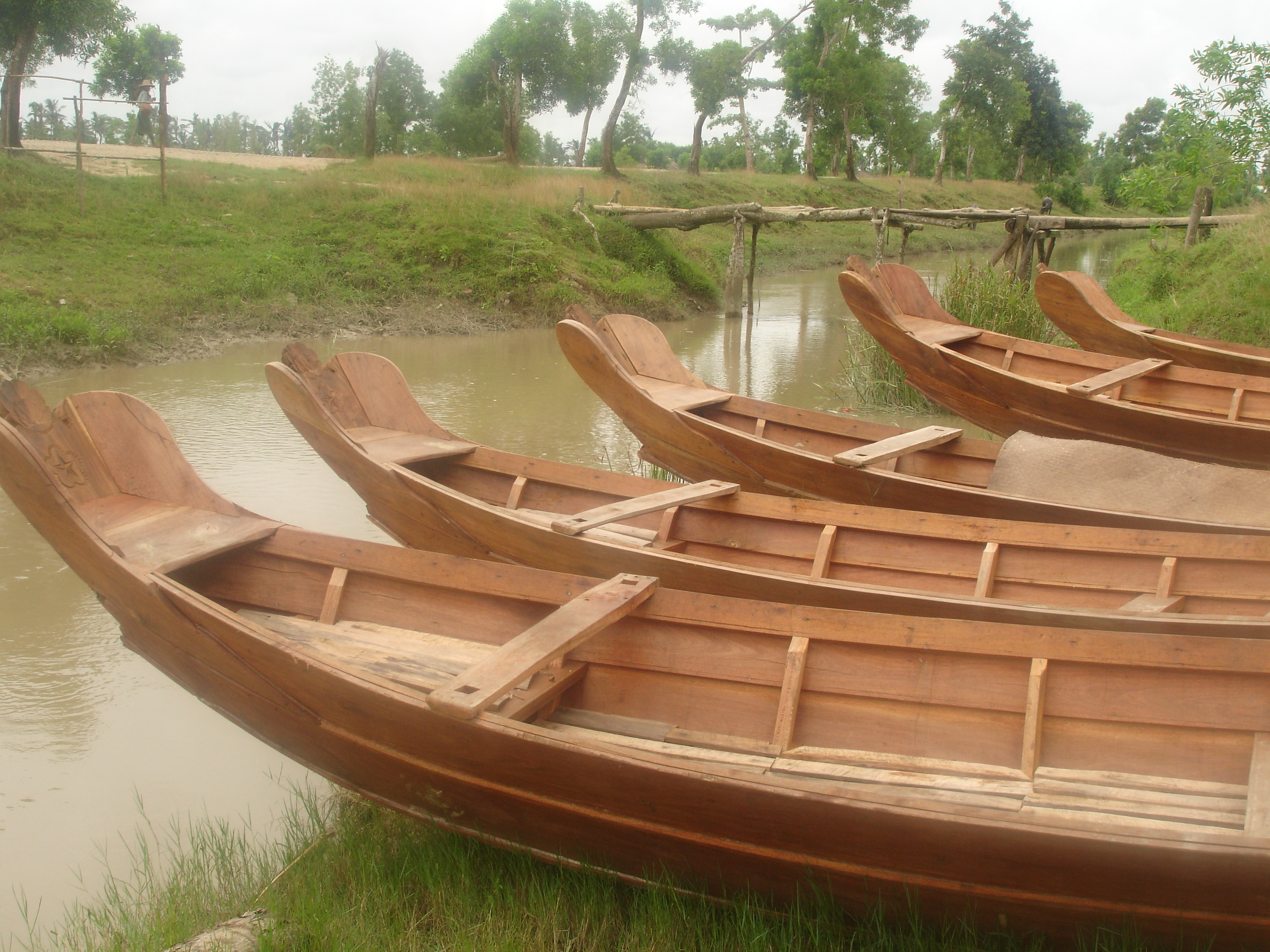 Some of the boats provided to fishermen outside Labutta as part of the government's relief and recovery effort. Of the 9,000 to built, four months on it remains unclear how many have been delivered.