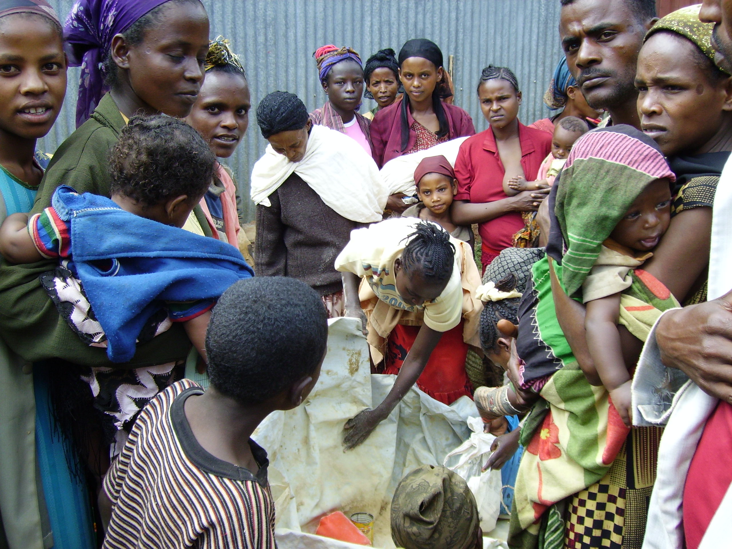 Recipients receiving supplementary foodstuffs distributed by Concern Worldwide in Badessa, Wolayita District of southern Ethiopia.