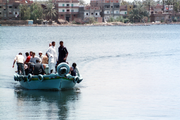 A ferry crossing from one side of the Nile to the other in the coastal city of Rashid, where migrants continue their journey into the Mediterranean Sea.
