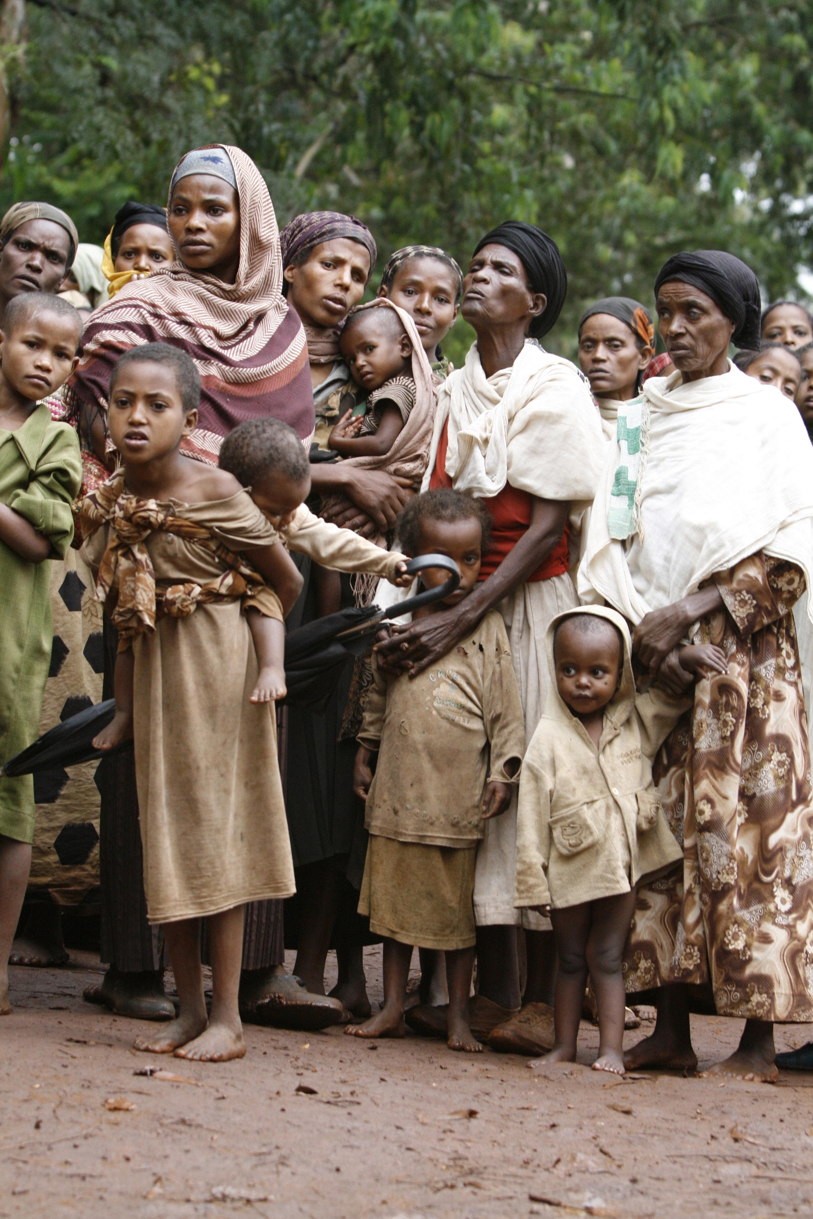Women wait in line to be examined at a medical centre in Tunto, southern Ethiopia on July 18, 2008. According to MSF 11,800 children suffering from severe acute malnutrition have been admitted to MSF centre in the Oromiya and Southern Nations and National