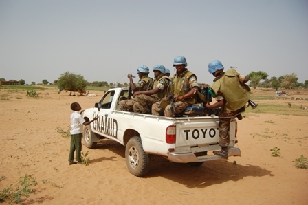 A UNAMID convoy patrols through Dali village in North Darfur. September 2008.