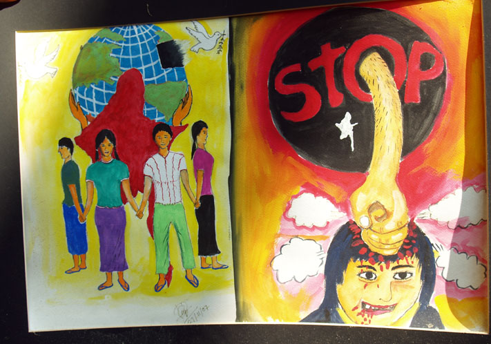 Drawings done by victims of sexual violence on display in the office of the Sexual and Gender Based Violence Committee (SGBV) in Mae La Camp in Thailand on the border with Myanmar