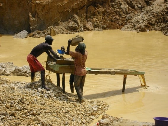 Gold miners in Ghana. A 2008 Human Rights Commission report stated communities living near gold mines were suffering human rights abuses and documented lack of compensation for land use and lost livelihoods