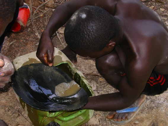 Gold miners in Ghana. A 2008 Human Rights Commission report stated communities living near gold mines were suffering human rights abuses and documented lack of compensation for land use and lost livelihoods