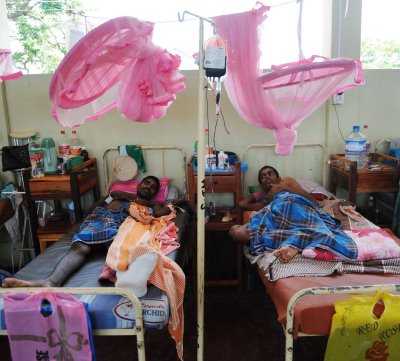Injured in the conflict, two men being treated by MSF at a hospital in Vavuniya, northern Sri Lanka. Thousands have fled fighting in the north