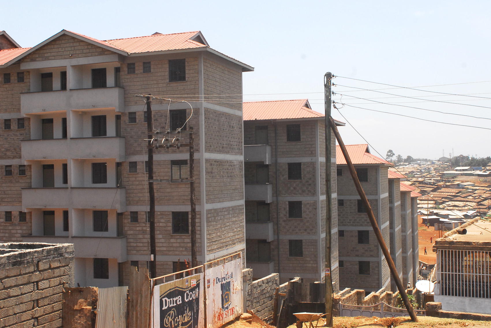 The new blocks of flats built for Kibera residents under the Kenya Slum-Upgrading Programme. Kibera is in the background