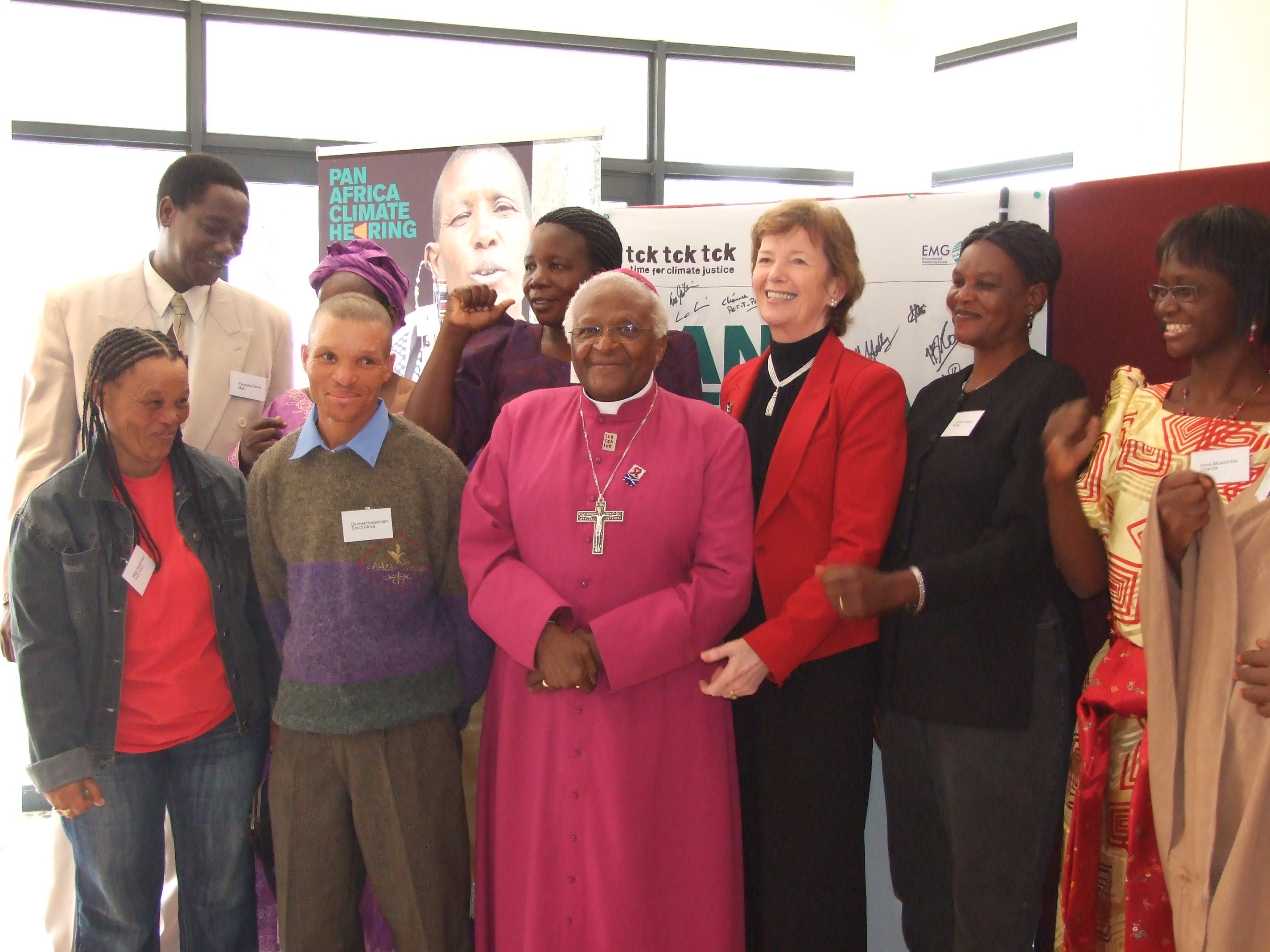 Emeritus Archbishop Desmond Tutu and Mary Robinson, (red jacket) former UN commissioner for human rights, with some of the witnesses from around Africa who gave their account of the impact of climate change at a special tribunal in Cape Town
