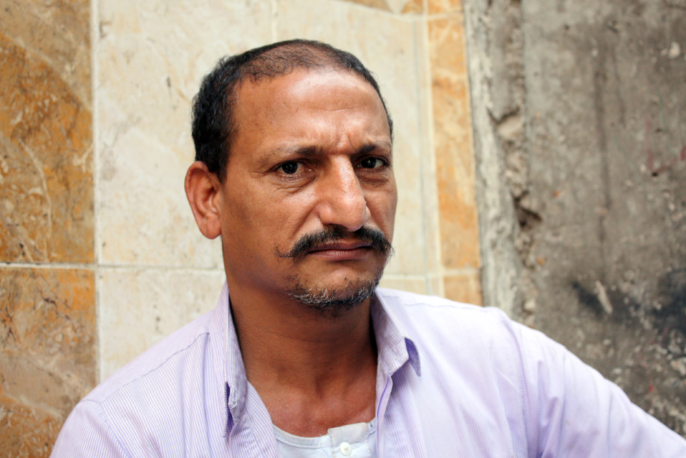 Karim Aweida, a former pig farmer, said he had to get rid of 10 of his 12 staff after all his pigs were culled by the government in May 2009