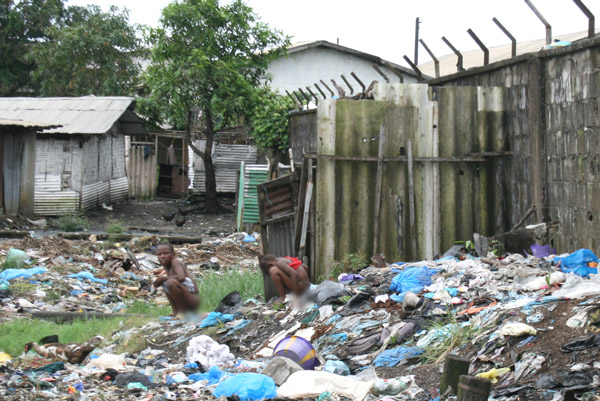 Rubbish dump where Sawmill residents openly defecate