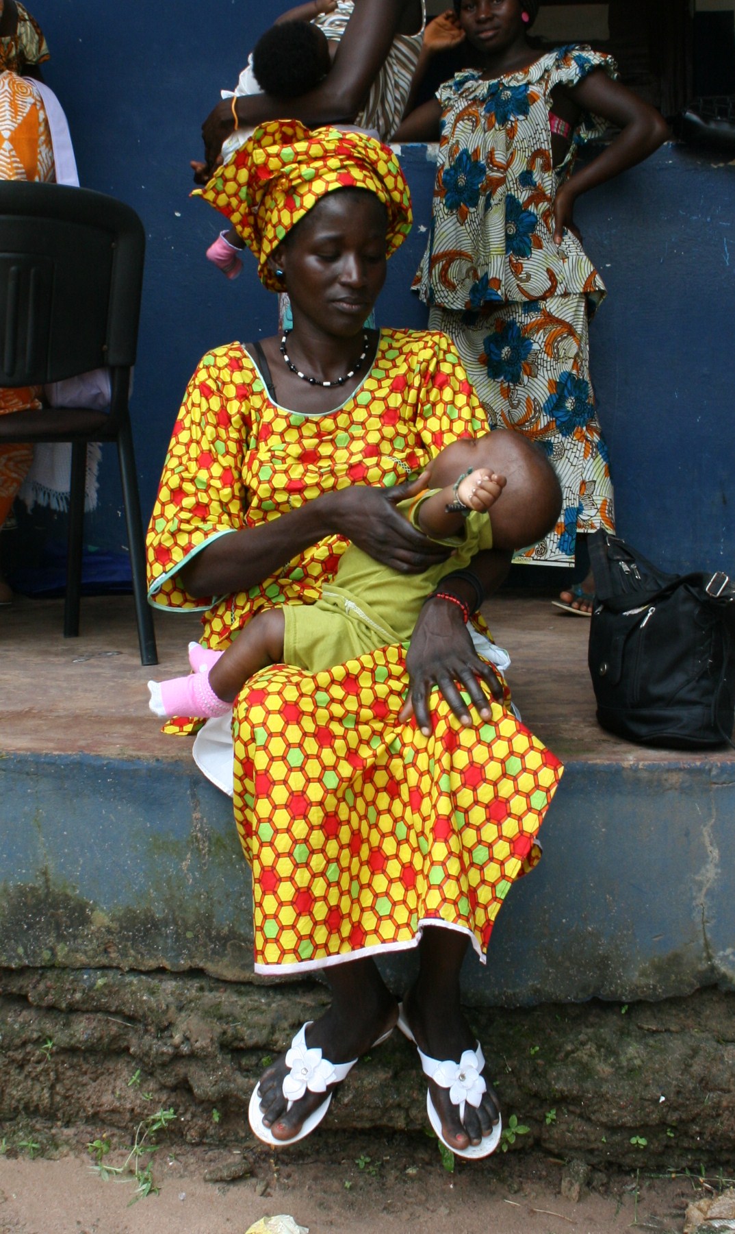 Woman waiting for her baby to be vaccinated at San Domingos hospital 90km from Bissau
