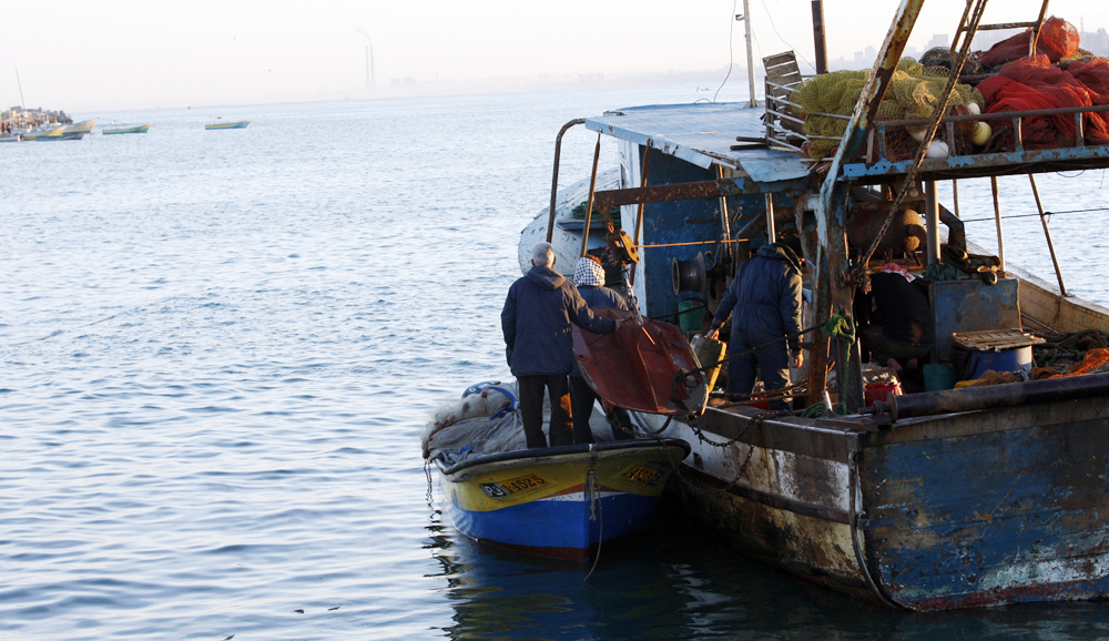 Gazan fishermen take high risks for a meagre reward