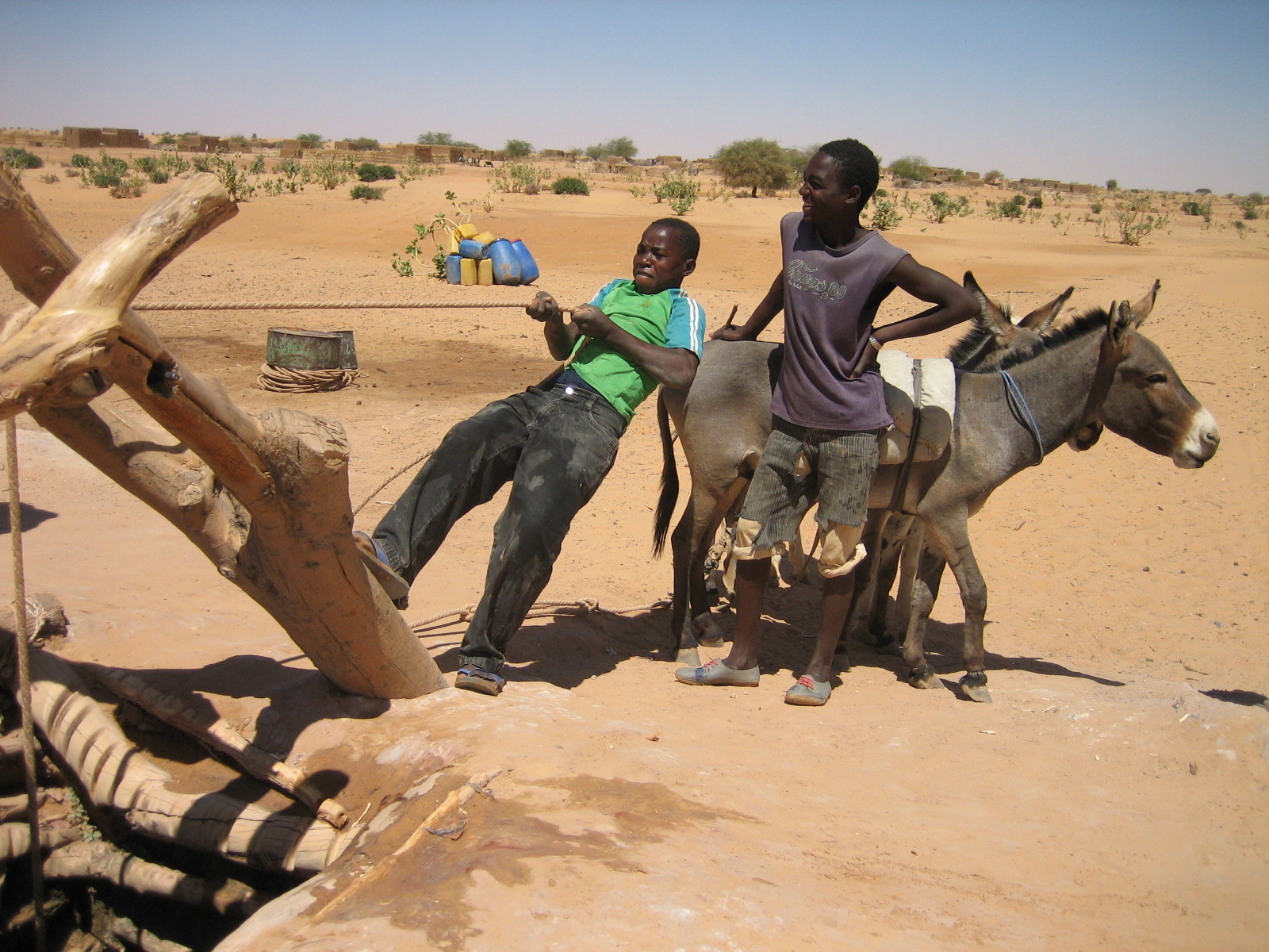 A traditional well near the village of Gouragass, near Tanout in Southern Niger. Usually, the hard task of drawing water from the 80-meter depth well is done by men, but is now down to children as young adult migrated to look for subsistance means after t