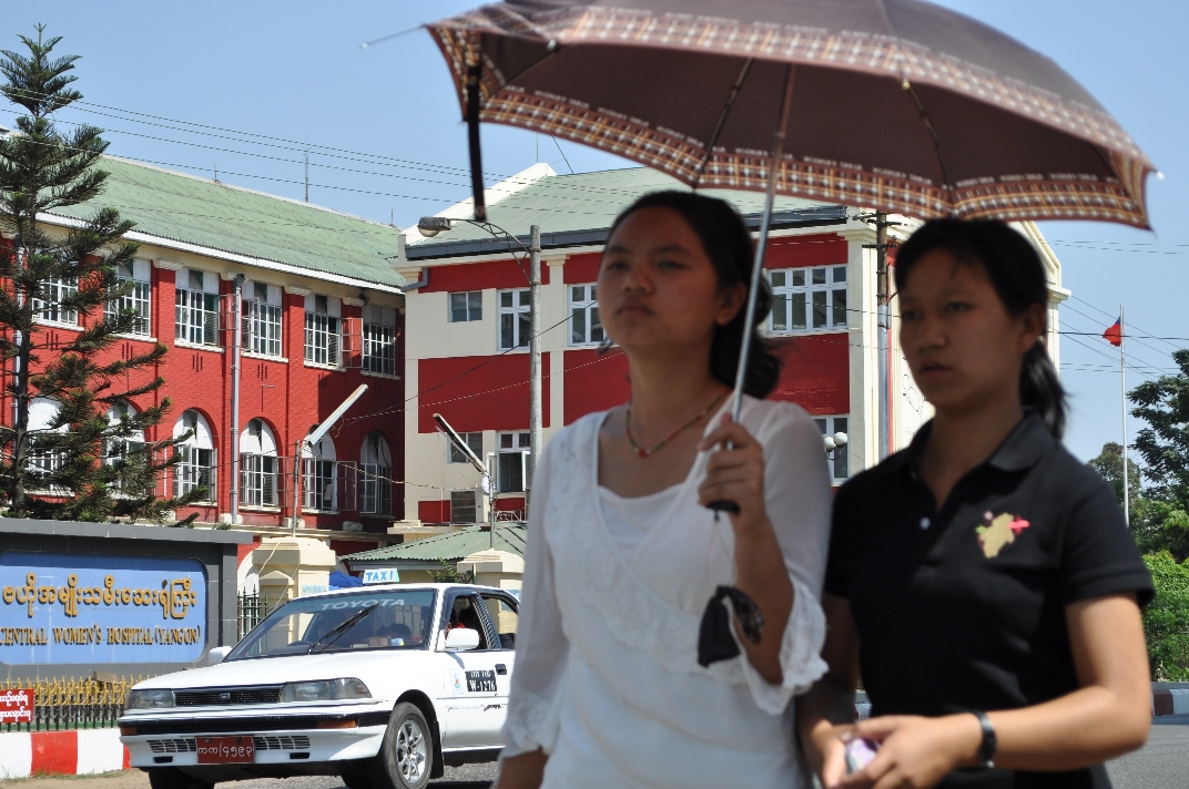 Two women in front of Central Women's Hospital in Yangon