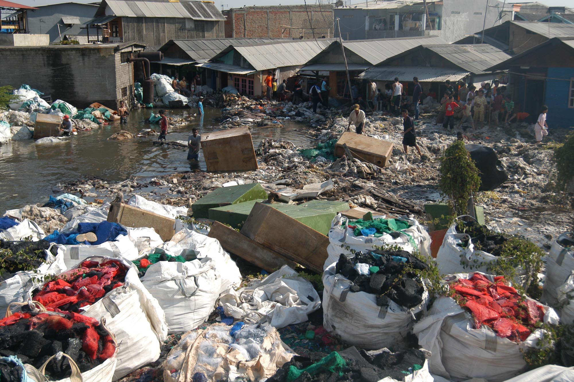 Crowded houses around a public dumping area at a slum outside of Jakarta