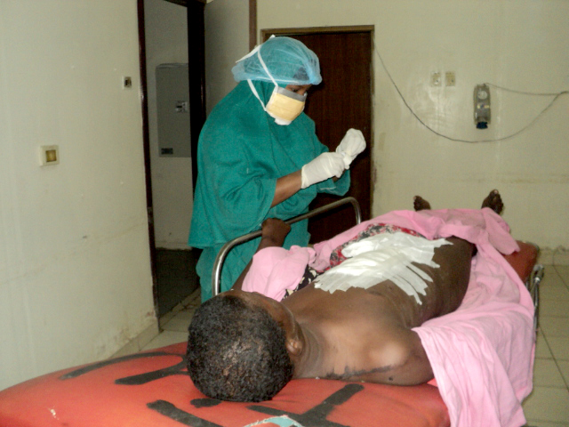 An injured civilian being of the recent violence in Mogadishu, being treated in Medina Hospital