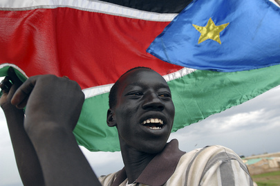 Residents of Abyei celebrate the decision of the Permanent Court of Arbitration, ruling on the boundaries of the Abyei Area after the two parties to the Comprehensive Peace Agreement referred the case to the court according to the Abyei Road Map