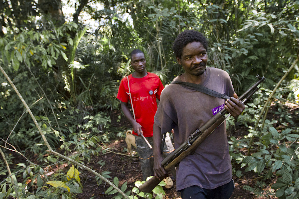 Arrow boys patroling the outskirts of Nzara town in Southern Sudan, looking out for threats of remnants of the LRA and the rivaling Ambororo tribe
