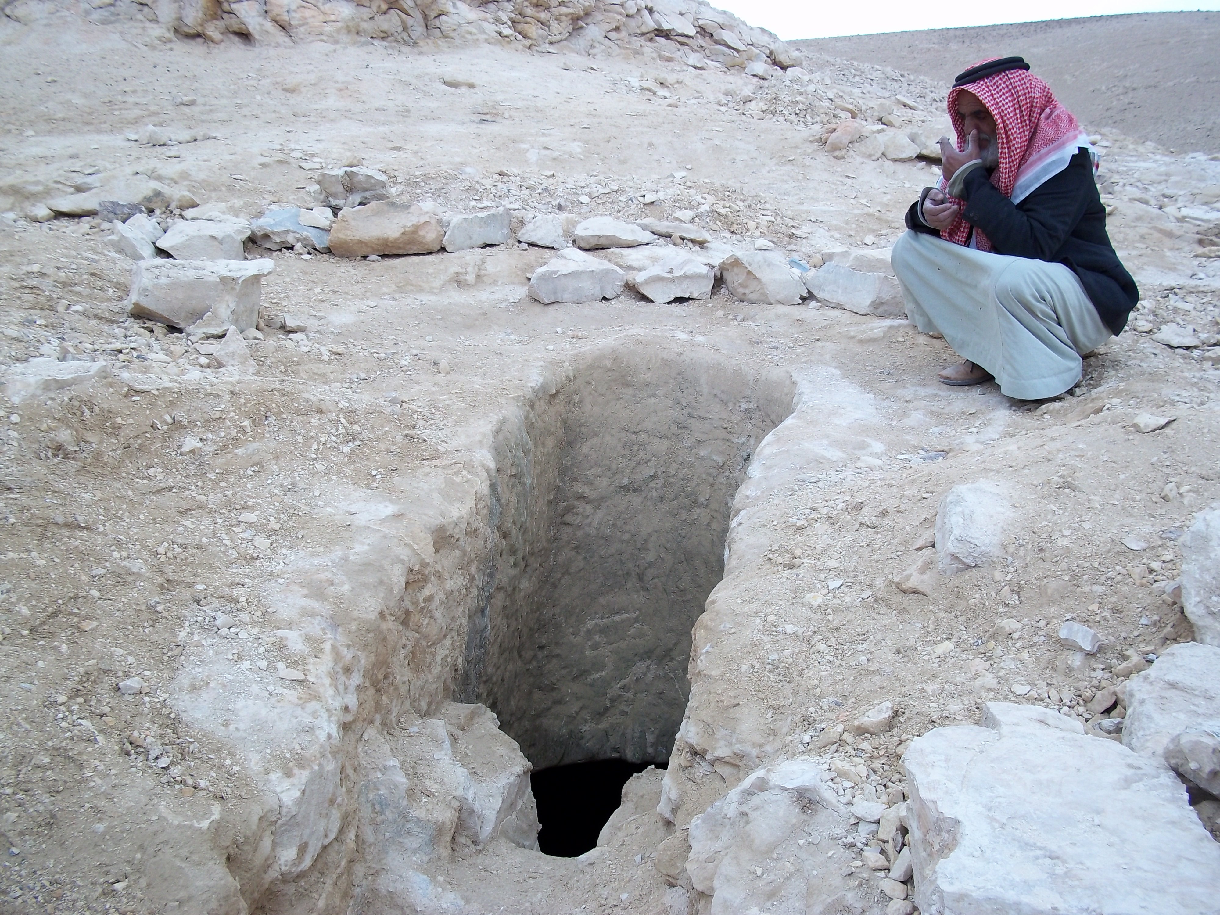 Yousef Hadaleen, Muktar (community leader) of Khashem ad-Daraj in south Hebron, stands beside a water cistern demolished by Israeli authorities in December. The cistern was built before 1948 by his ancestors. Cisterns, used to collect rainwater, are the o