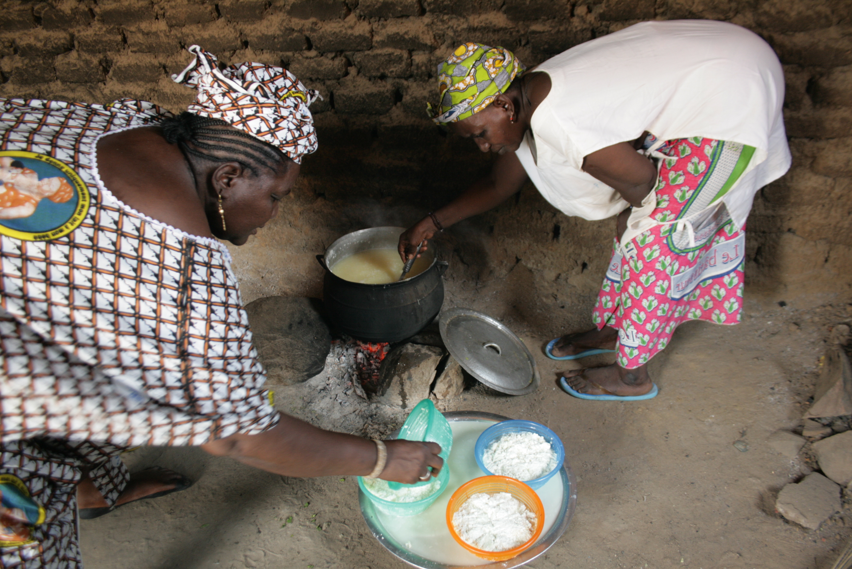Women making cheese at a local dairy in Dori, northeastern Burkina Faso. June 2011