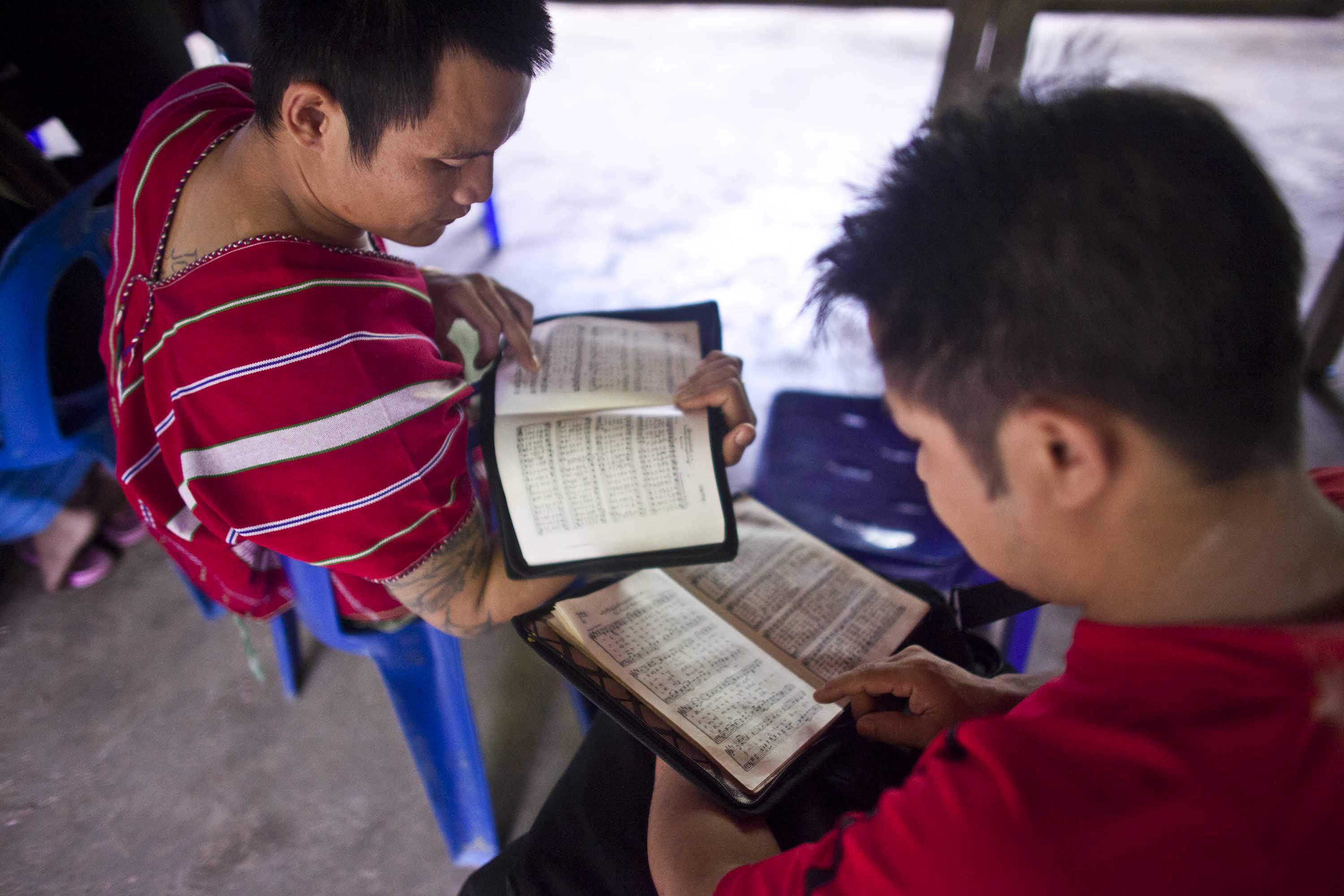 Ethnic Karen refugee students study for an test at Mae La refugee camp along the Thai-Myanmar border. As refugees search for third country sponsors, the brightest and best equipped are usually the first to leave
