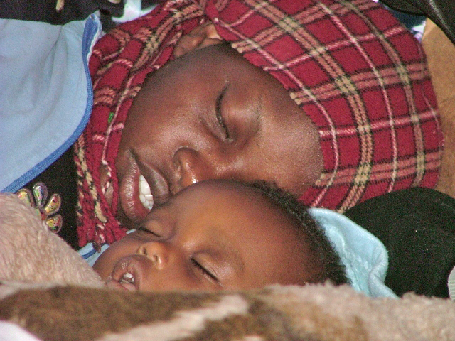 A young Sudanese asylum seeker and her baby, two days after they've made the harsh journey the border into Israel