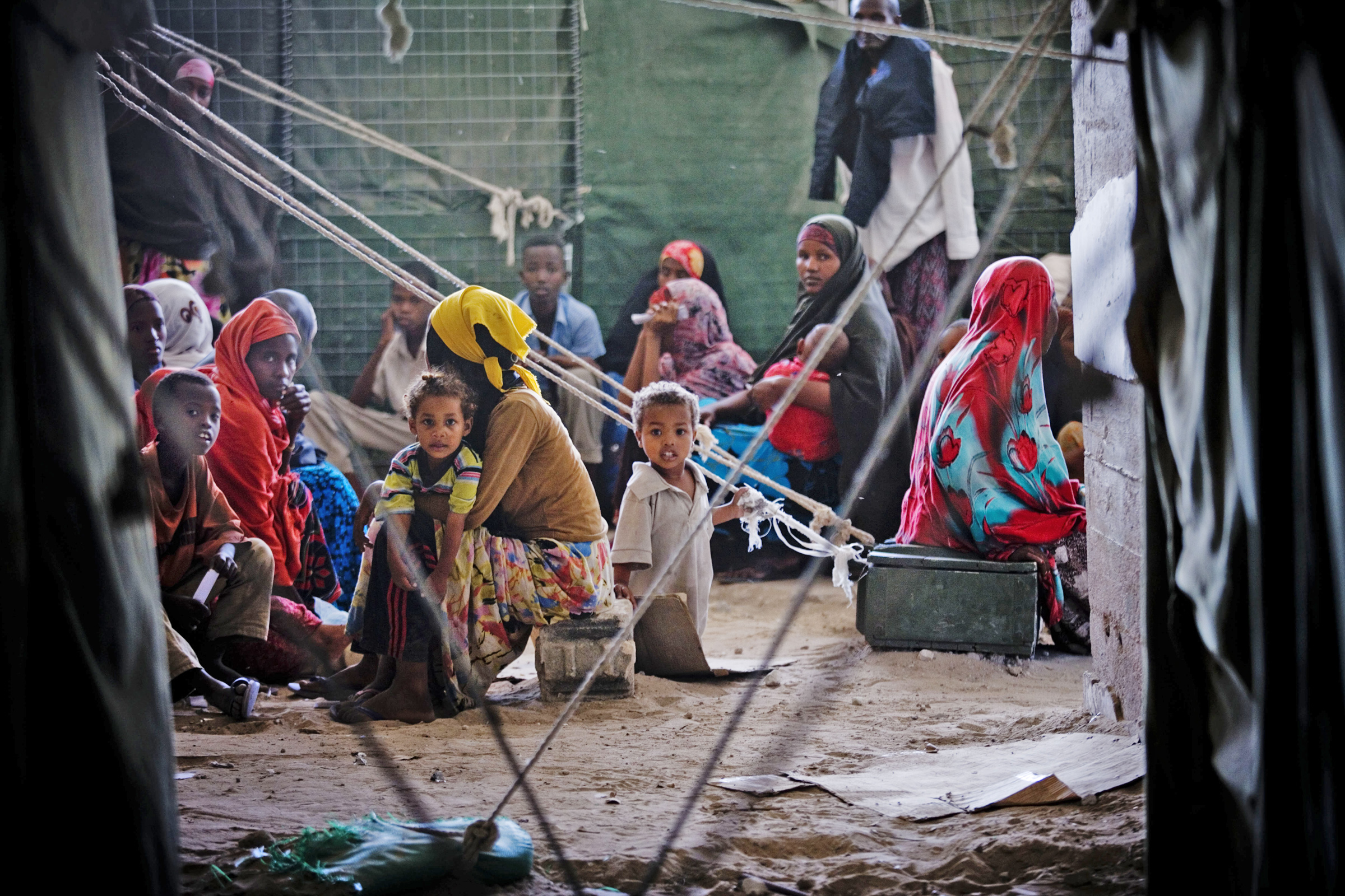 Women and children await treatment at Outpatients Unit run by AMISOM in the Aruba Hotel, Mogadishu, Somalia