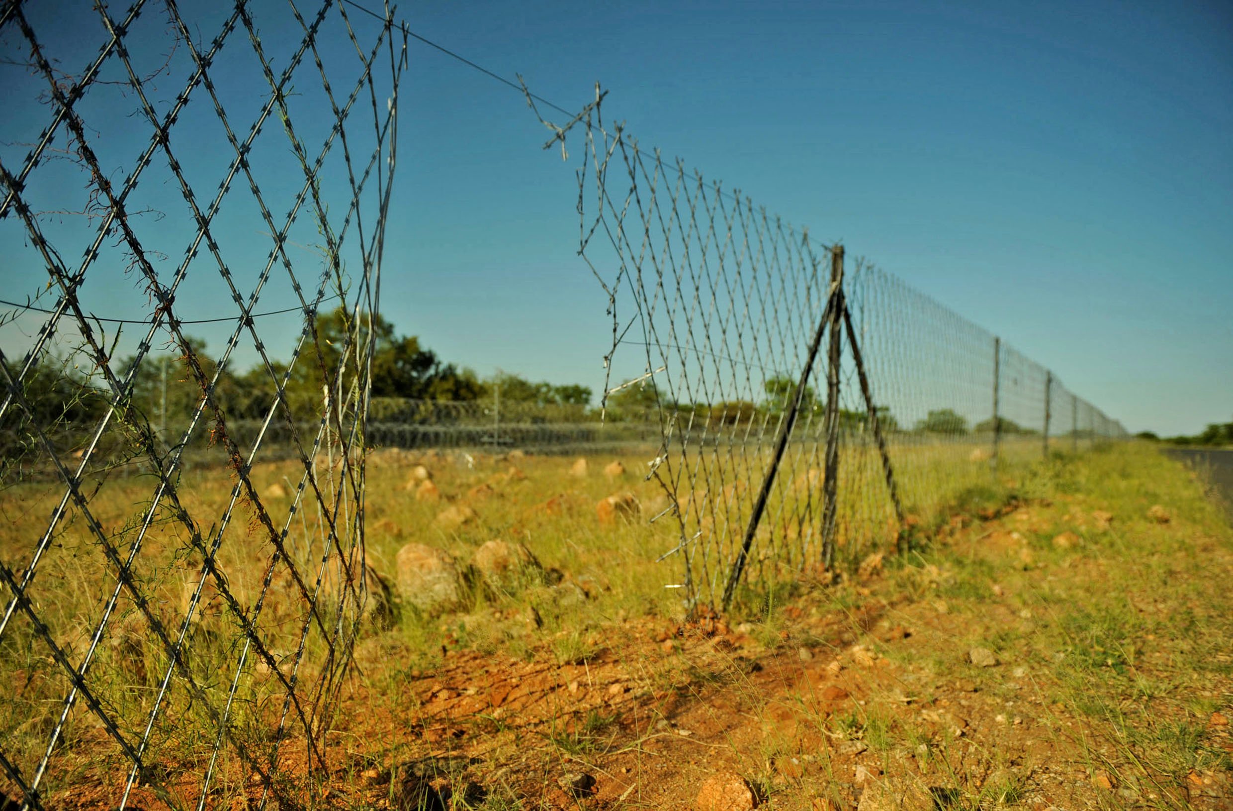 One of the many holes in the 250km razor wire fence along the Zimbabwe-South Africa border which allow easy access to would-be intruders