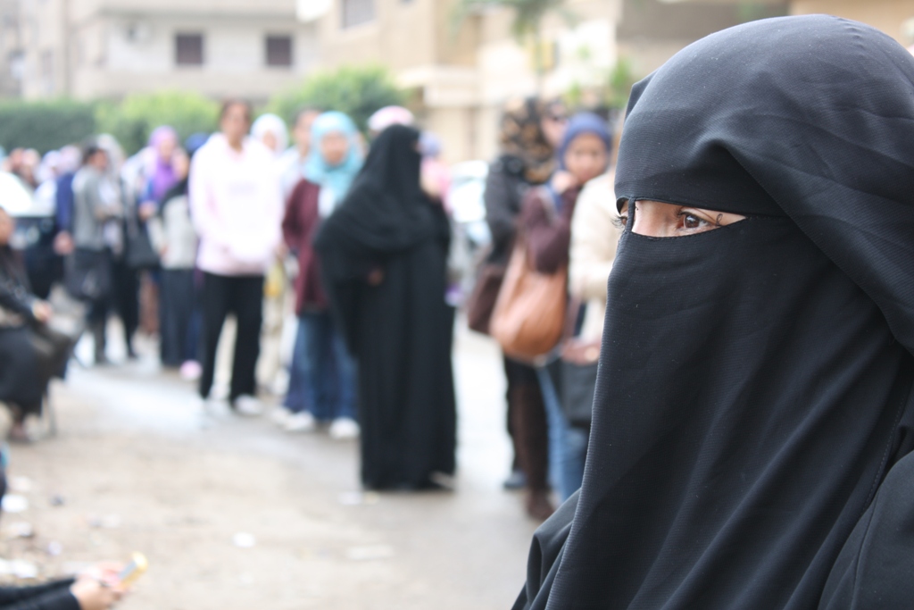 Hayam Yousef, a mother of three, waits in line for her turn to vote in Egypt's first elections since pro-democracy demonstrators forced the fall of President Hosni Mubarak in February 2011. Cairo, November 2011