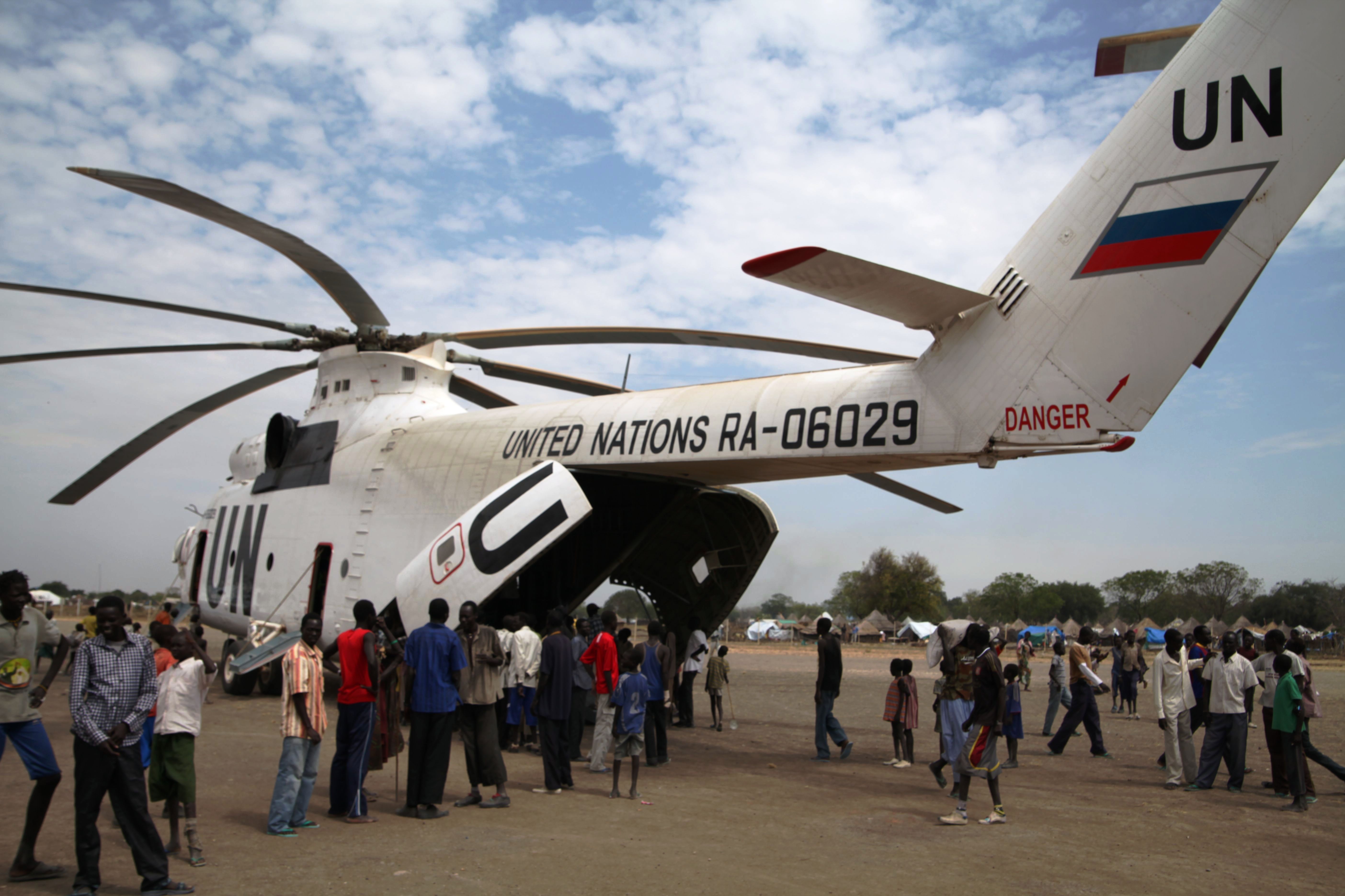 Crowds gather around a UN helicopter in Pibor town in South Sudan’s Jonglei state, where intercommunal violence has affected 140,000 people