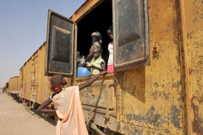 After waiting for over a year to go to South Sudan, some southerners have set up home in abandoned train carriages at Khartoum's Shajara railway station