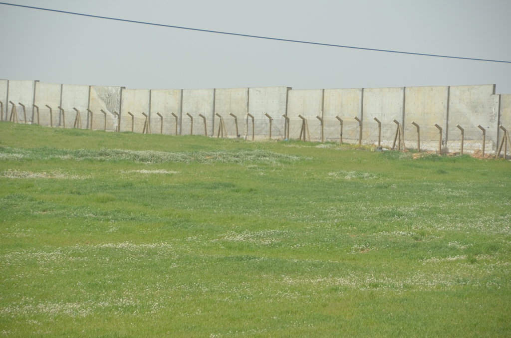 A wall divides the Syrian and Jordanian borders near the official border crossing just outside the northern Jordanian town of Mafraq. Other parts of the border are delineated with barbed wire only and easier for refugees fleeing Syria to cross