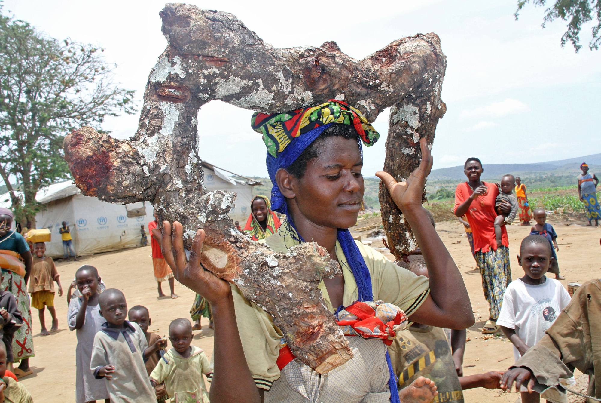 Congolese woman carrying firewood at Nakivale reception centre, Isingiro district, western Uganda