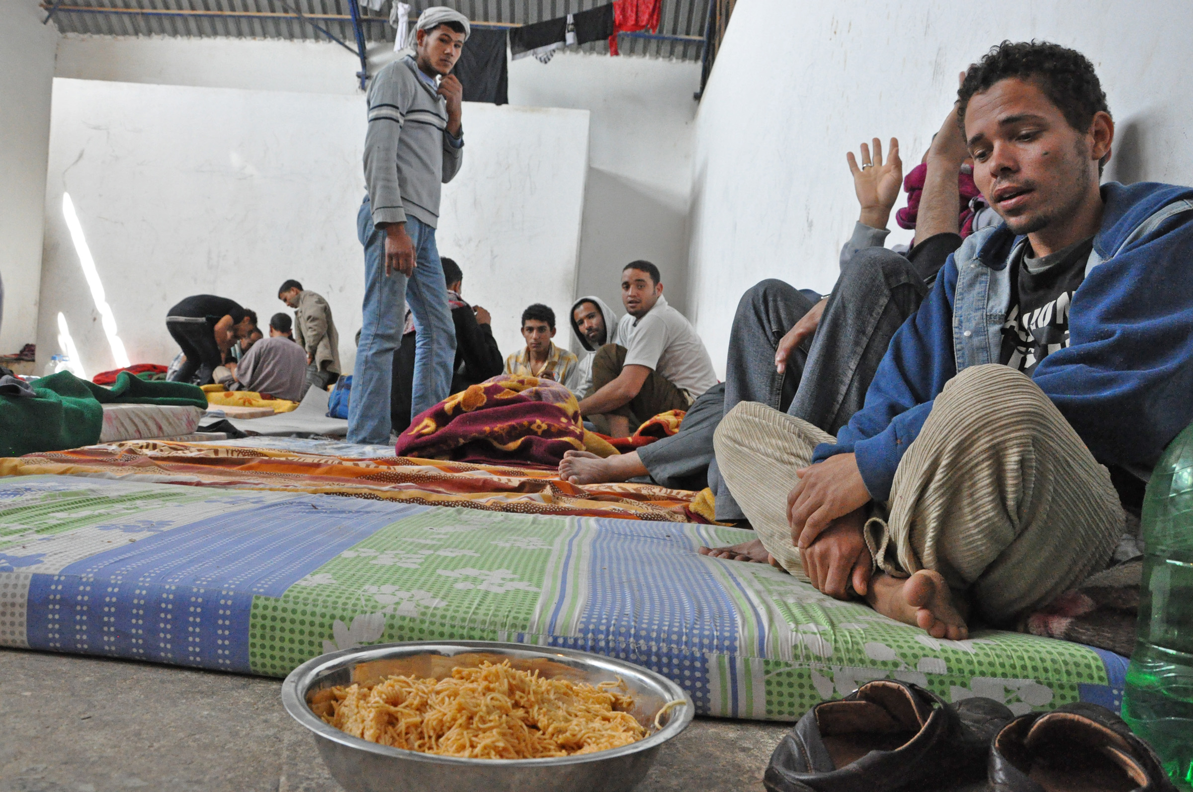 Authorities say food is provided 3 times a day for detainees, but it consists of nothing more than a bowl of spaghetti shared between groups of 5 people