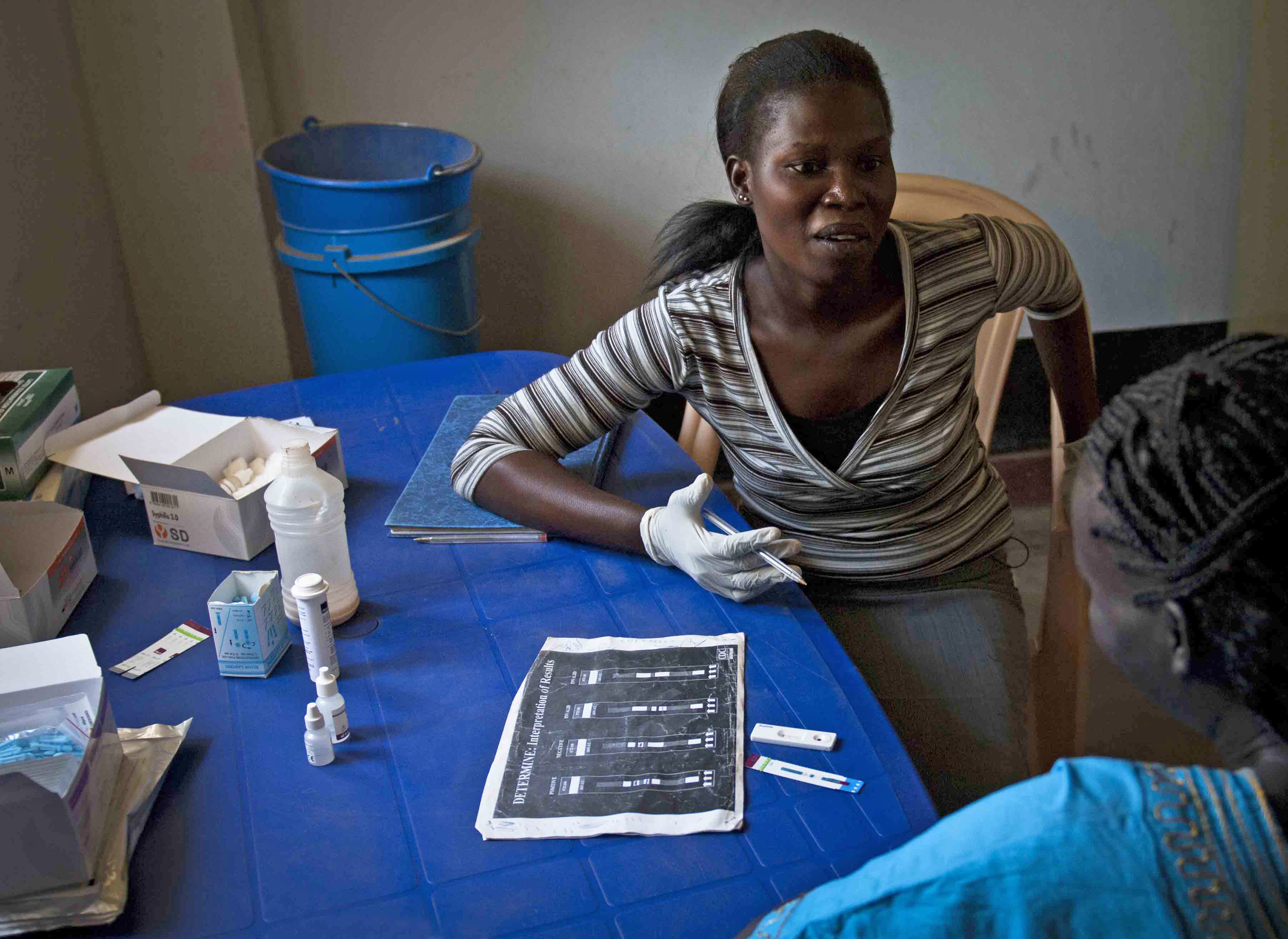 An HIV counsellor at a Primary Health Care Centre in Juba explains to a
