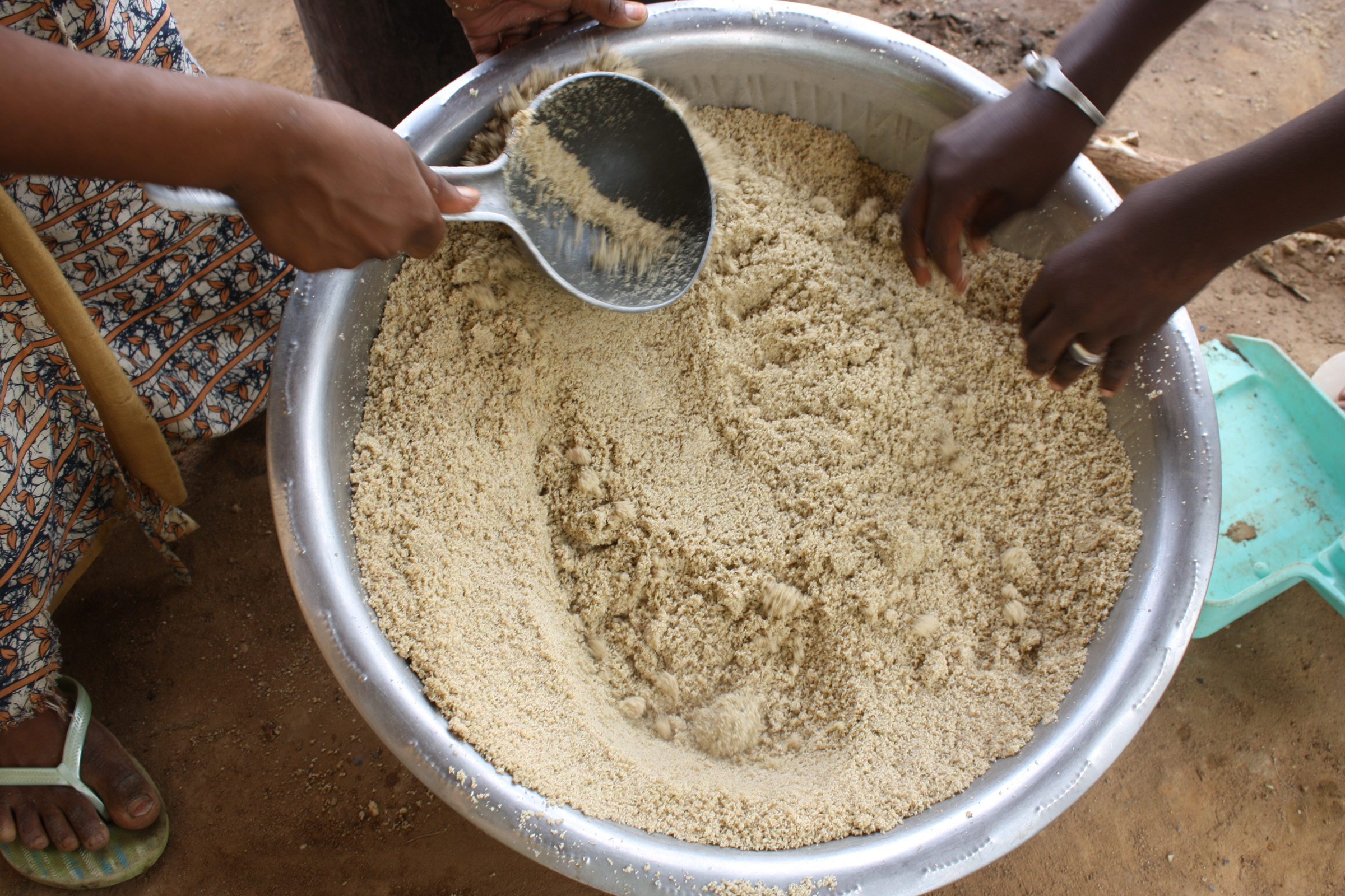 Families in the drought-affected Djoke village in Gorgol region, one of the three regions that form Mauritania's triangle of poverty pool their food reserves and eat together every day