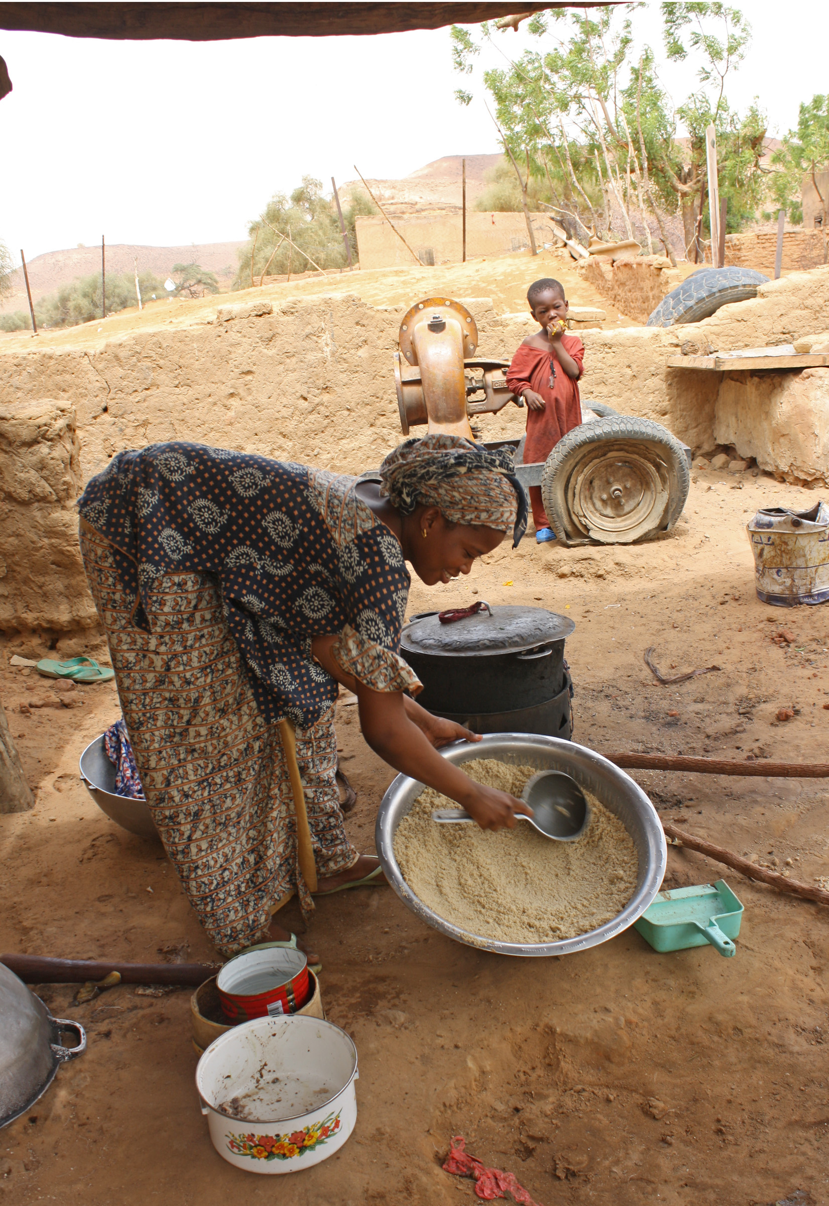 Families in the drought-affected Djoke village in Gorgol region, one of the three regions that form Mauritania's triangle of poverty pool their food reserves and eat together every day